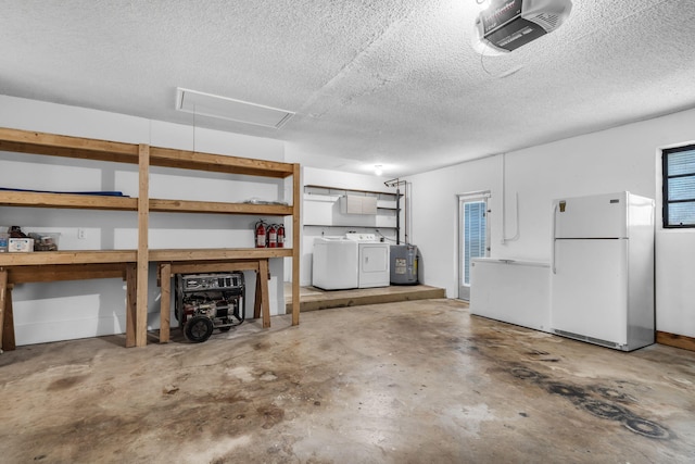 garage featuring independent washer and dryer, a garage door opener, electric water heater, and white fridge