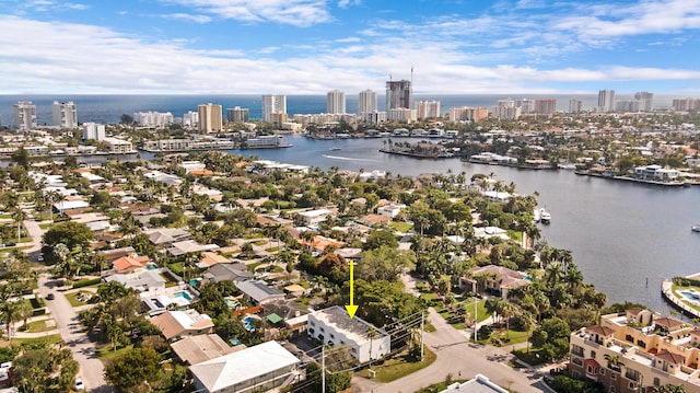 birds eye view of property featuring a water view