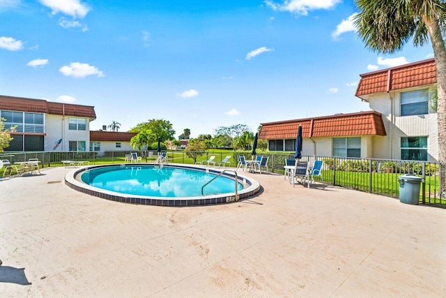 view of pool with a patio