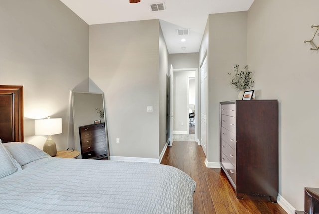 bedroom featuring dark wood-type flooring