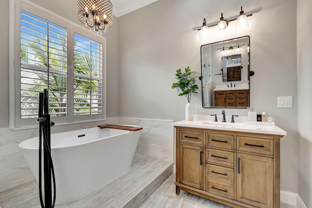 bathroom featuring vanity, a bathtub, tile walls, and a notable chandelier