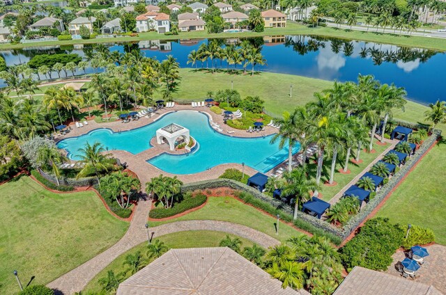 view of pool with a water view