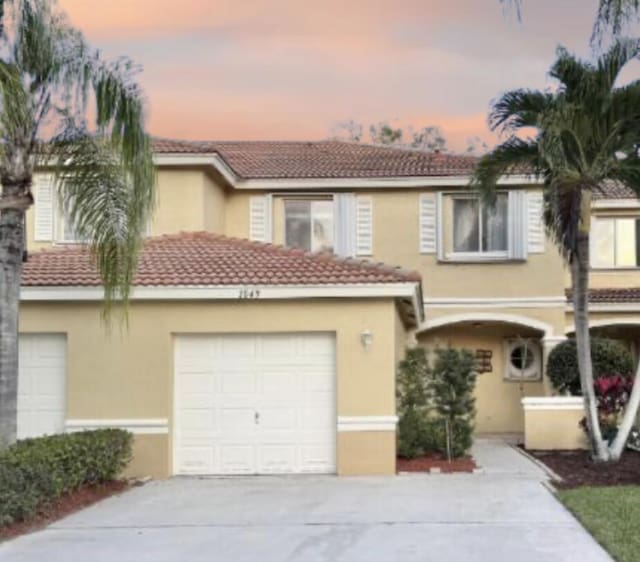 view of front of property with a garage