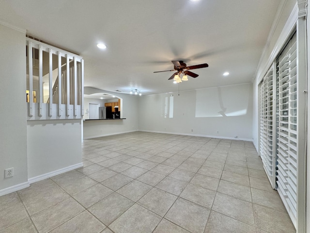 unfurnished living room featuring light tile patterned floors and ceiling fan