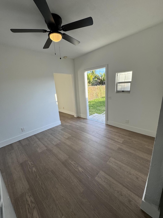 spare room with hardwood / wood-style floors