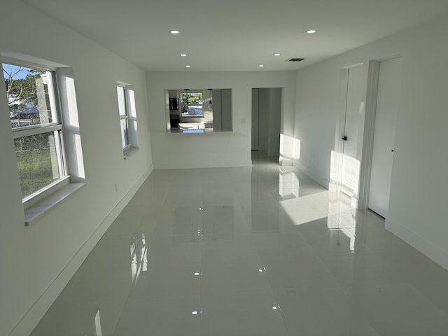 empty room featuring light tile patterned floors