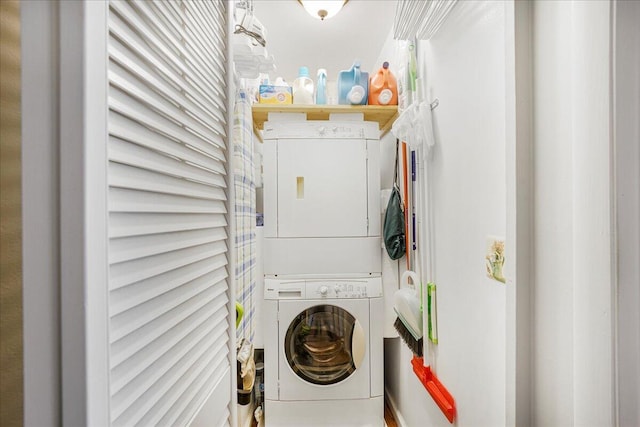 laundry room featuring stacked washing maching and dryer