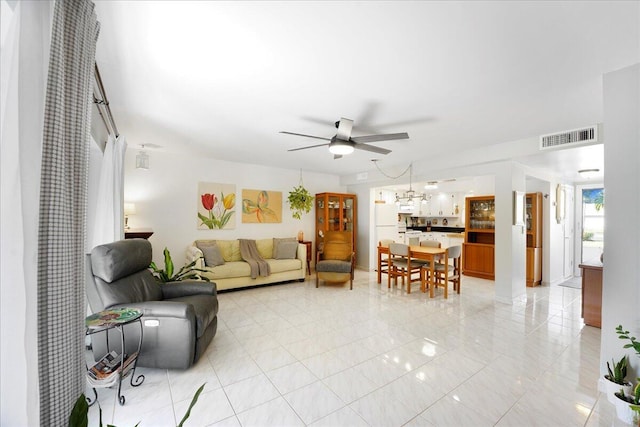 living room featuring ceiling fan