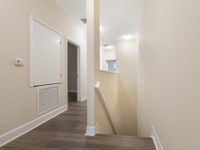 773 Pipers Cay Dr, West Palm Beach, FL 33415 - hall featuring an upstairs landing, wood finished floors, baseboards, and a textured wall