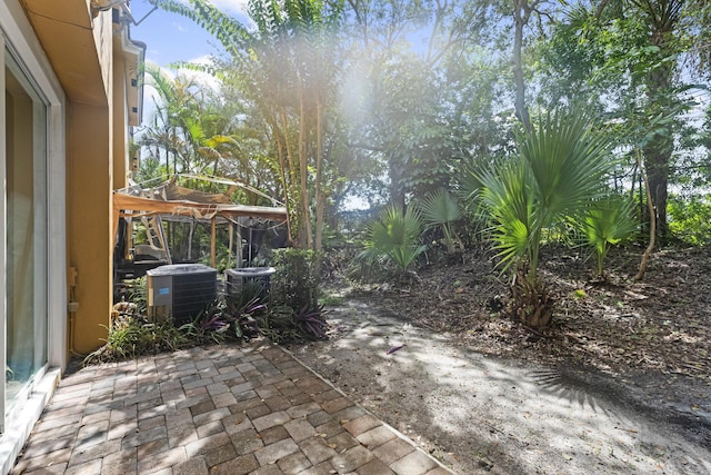 view of patio with central AC unit