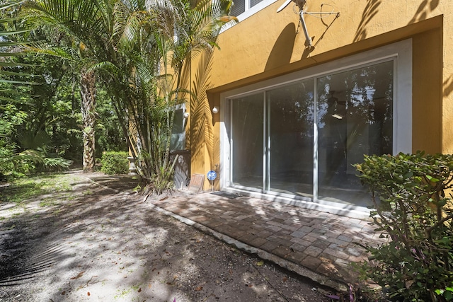 property entrance with a patio area