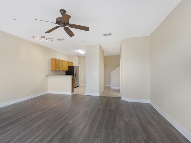 773 Pipers Cay Dr, West Palm Beach, FL 33415 - unfurnished living room with a ceiling fan, dark wood finished floors, and baseboards