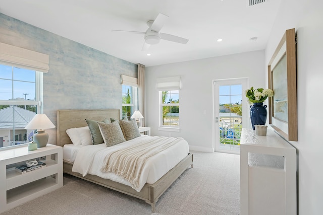 carpeted bedroom with access to exterior, visible vents, wallpapered walls, baseboards, and recessed lighting