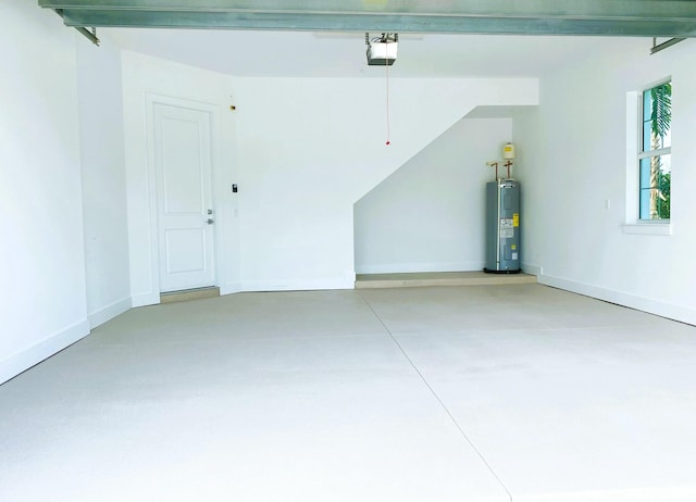 garage with water heater, a garage door opener, and baseboards