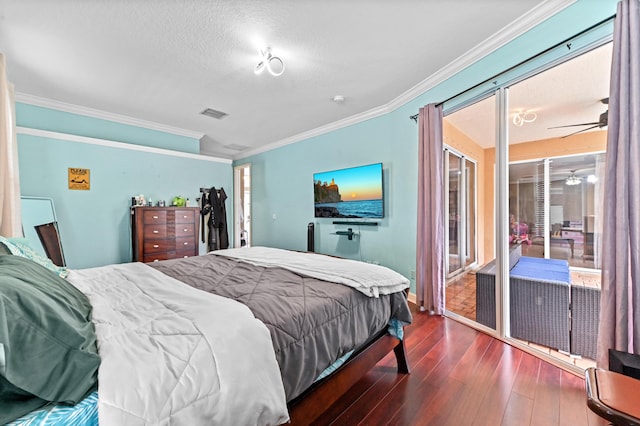 bedroom featuring access to outside, ornamental molding, dark hardwood / wood-style floors, and a textured ceiling