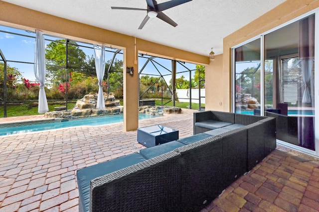 view of patio featuring pool water feature, an outdoor hangout area, ceiling fan, and a lanai