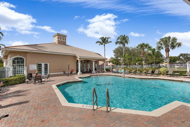 view of swimming pool featuring a patio