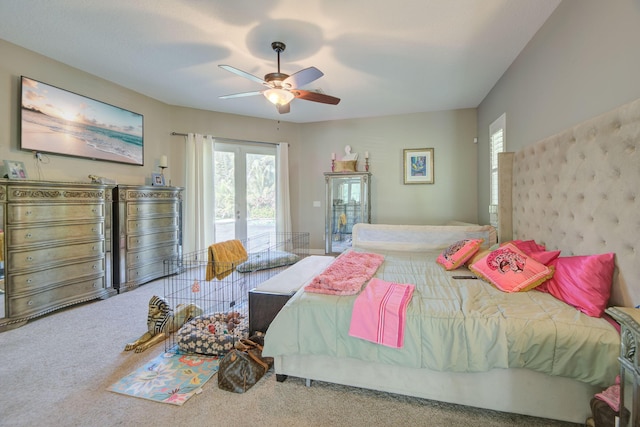 bedroom featuring access to outside, french doors, ceiling fan, and carpet flooring