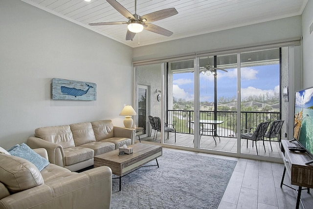 living area with crown molding, wood finished floors, ceiling fan, and wooden ceiling