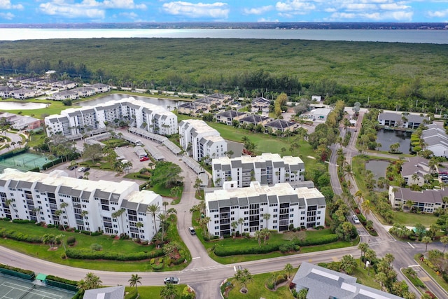 bird's eye view with a water view