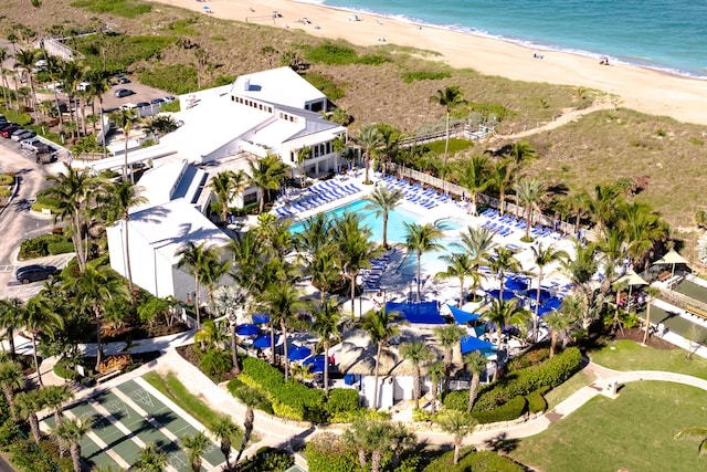 bird's eye view featuring a view of the beach and a water view