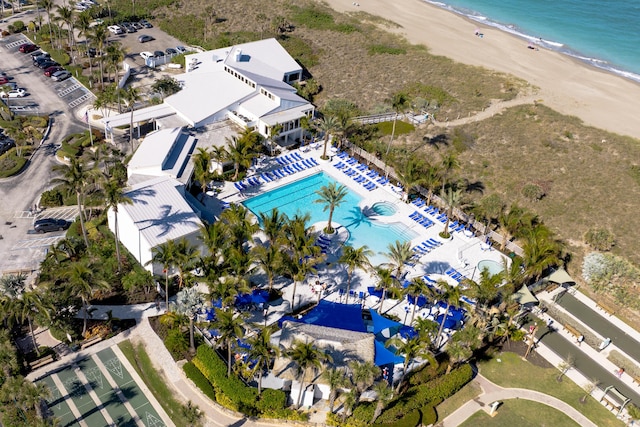 aerial view featuring a view of the beach and a water view