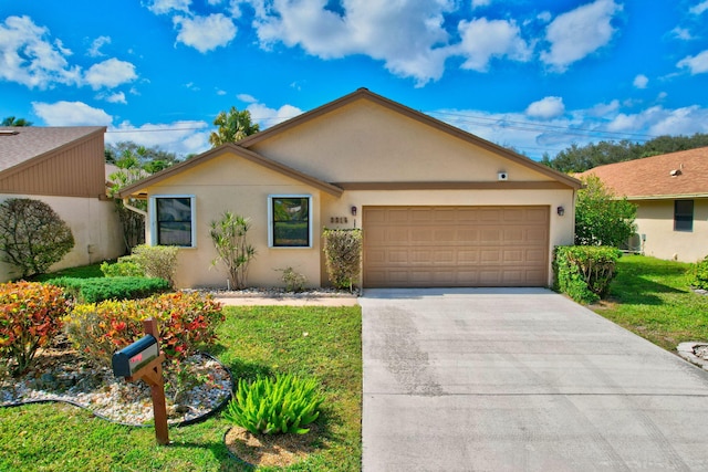 3215 NW 12th St, Delray Beach, FL 33445 - ranch-style house with stucco siding, driveway, a garage, and a front lawn