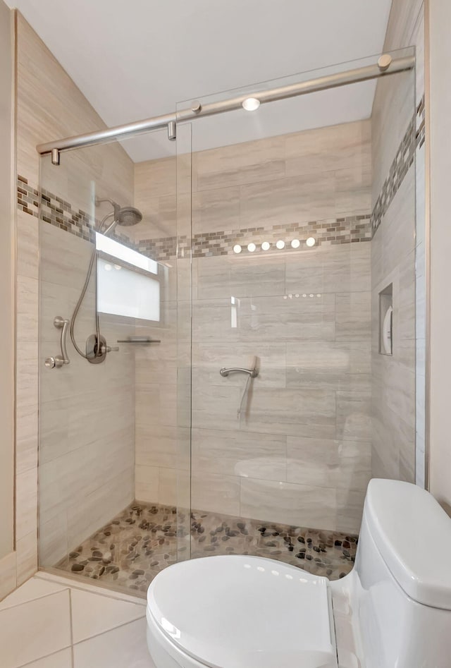 3215 NW 12th St, Delray Beach, FL 33445 - full bathroom with toilet, a stall shower, and tile patterned floors