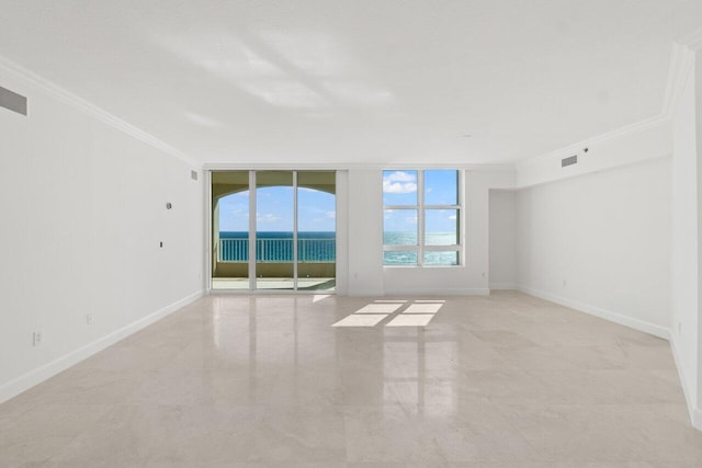 unfurnished room featuring ornamental molding, floor to ceiling windows, and a water view