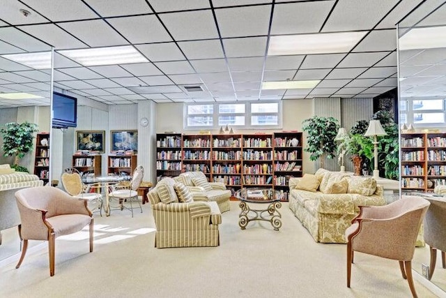 interior space featuring a drop ceiling