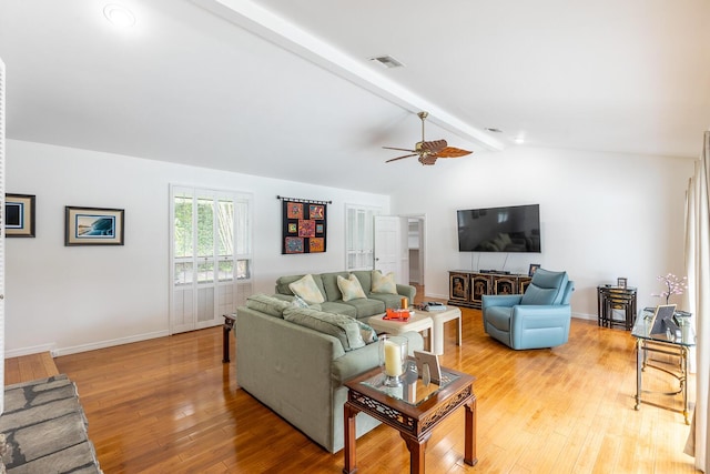 living area with light wood finished floors, baseboards, visible vents, lofted ceiling with beams, and ceiling fan