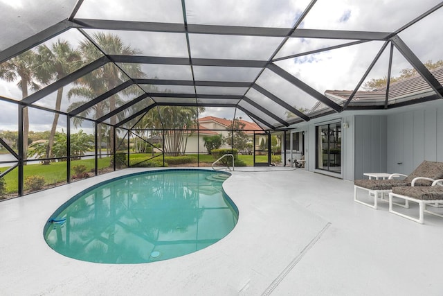 pool featuring a patio area and a lanai