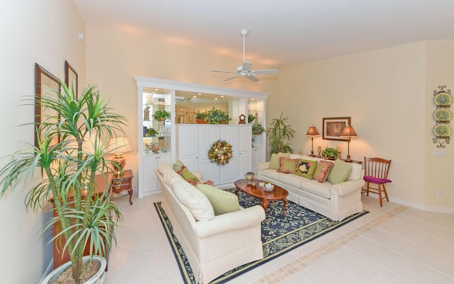 living room with light tile patterned floors and ceiling fan