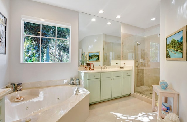 full bath featuring tile patterned flooring, a jetted tub, a shower stall, and vanity