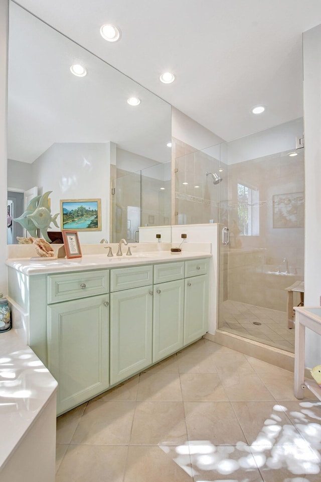 full bath with tile patterned flooring, a shower stall, vanity, and recessed lighting