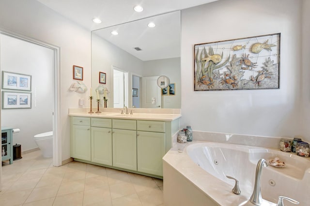 full bathroom with toilet, recessed lighting, vanity, tile patterned floors, and a tub with jets