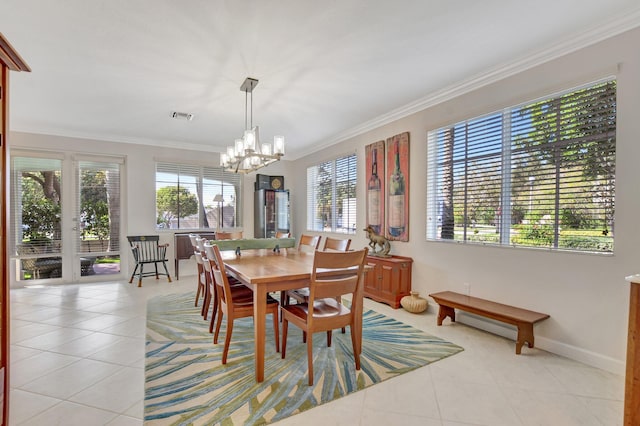 dining area featuring a notable chandelier, light tile patterned floors, visible vents, ornamental molding, and baseboards