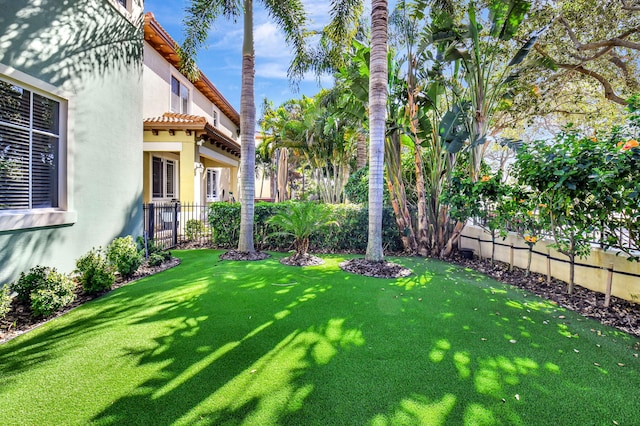 view of yard with fence