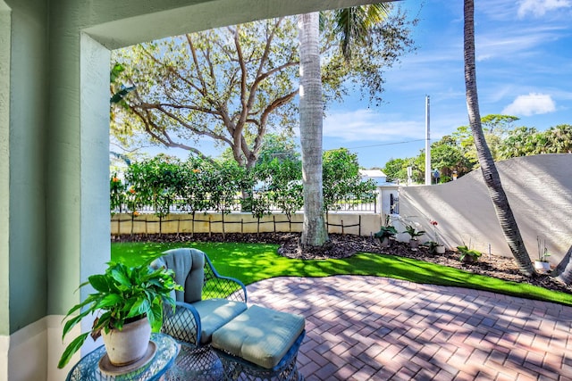 view of patio / terrace with fence