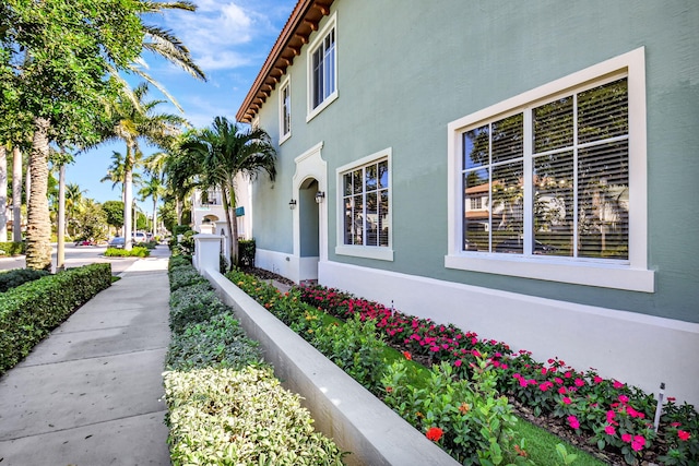 view of property exterior with stucco siding