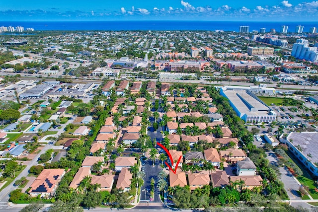 drone / aerial view with a water view