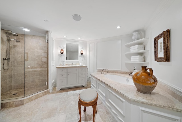 bathroom with ornamental molding, vanity, and a shower with shower door