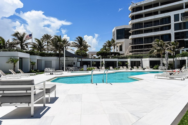 view of swimming pool featuring a patio