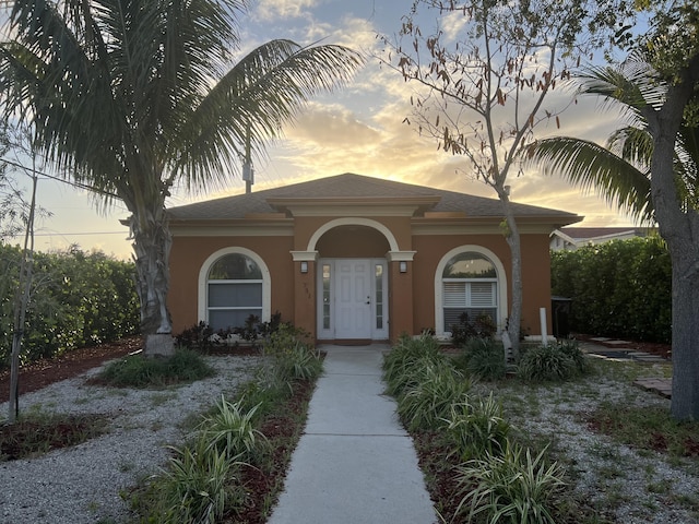 731 S J St, Lake Worth Beach, FL 33460 - mediterranean / spanish house with stucco siding and roof with shingles