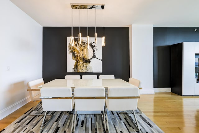 dining room featuring light hardwood / wood-style flooring