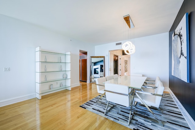 dining area with light wood-type flooring