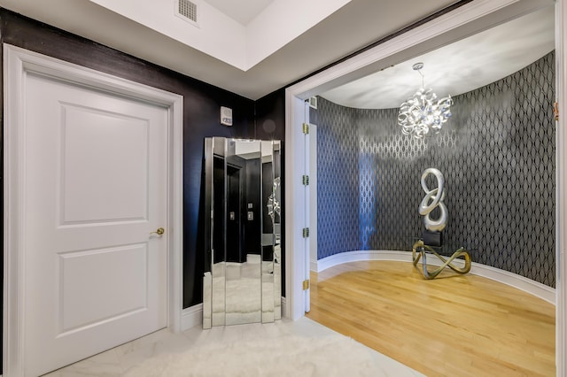 interior space with a chandelier