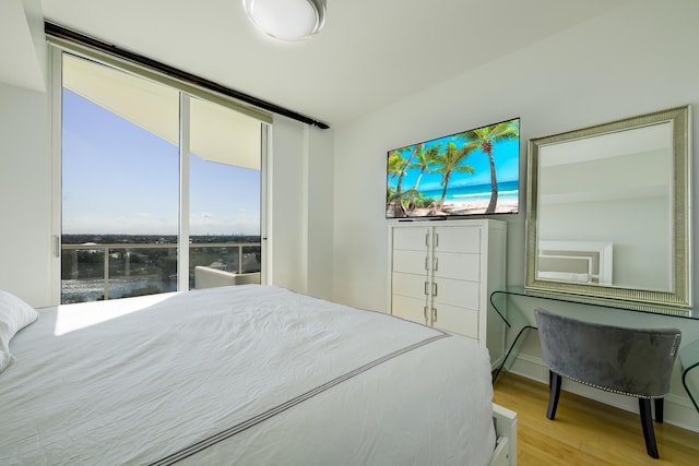 bedroom featuring light wood-type flooring