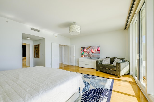 bedroom featuring hardwood / wood-style flooring