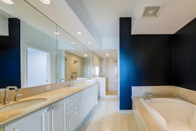 bathroom featuring vanity, separate shower and tub, and tile patterned flooring